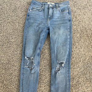 Light blue ripped skinny jeans